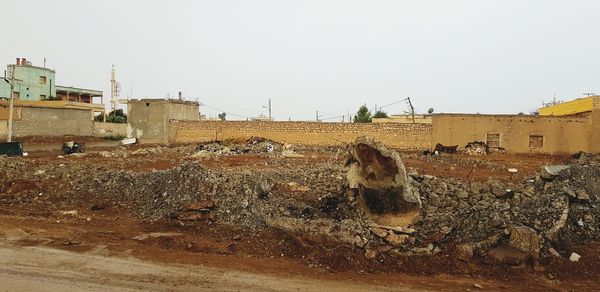 View of old buildings against clear sky