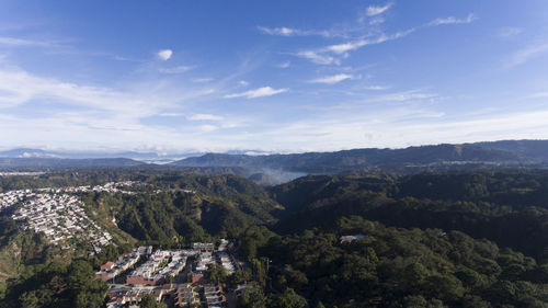 Aerial view of townscape against sky