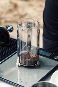 Close-up of beer glasses on table