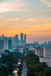 High angle view of buildings against sky during sunset