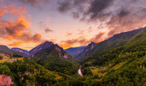 Scenic view of mountains against sky during sunset