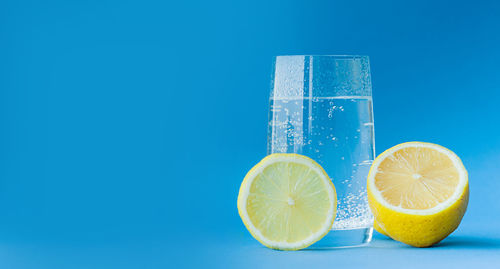 View of drink against blue background