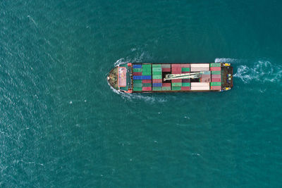 High angle view of ship sailing in sea