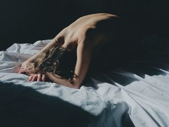 Woman sleeping on bed