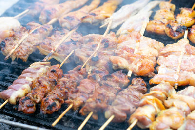 High angle view of meat on barbecue grill