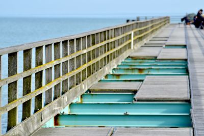 View of pier over sea against sky