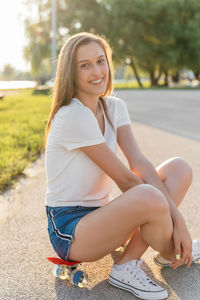 Portrait of a beautiful teenage girl smiling and looking at camera