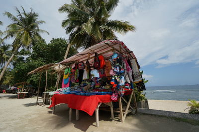 Built structure on beach against sky