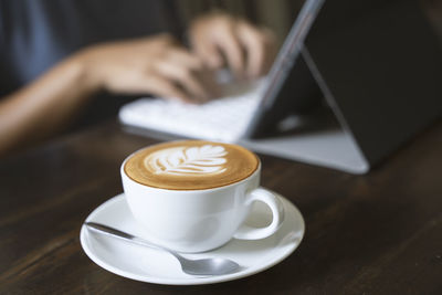 Coffee cup on table