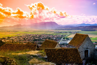 High angle view of townscape against sky during sunset