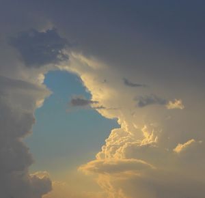 Low angle view of clouds in sky during sunset