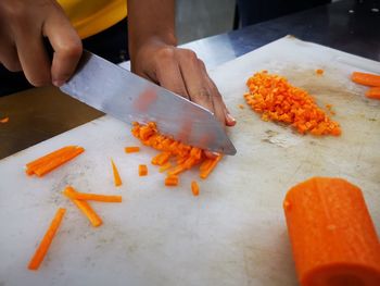 Midsection of person preparing food