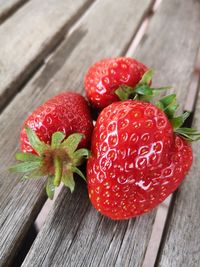 High angle view of strawberries on table