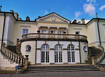 Low angle view of building against blue sky