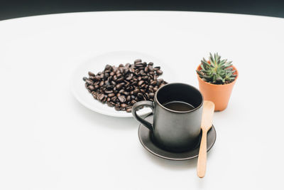 Close-up of coffee beans on table