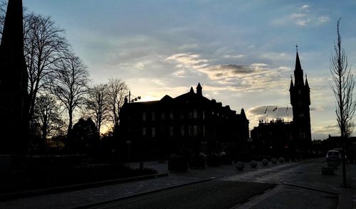 Road with buildings in background