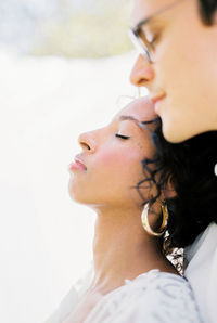 Close-up of young woman looking away