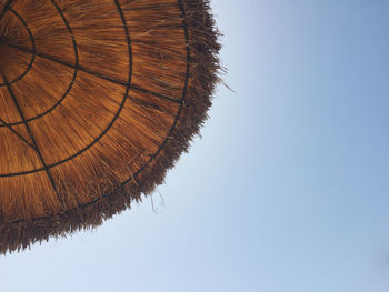 Low angle view of trees against clear sky