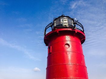 Low angle view of lighthouse against blue sky