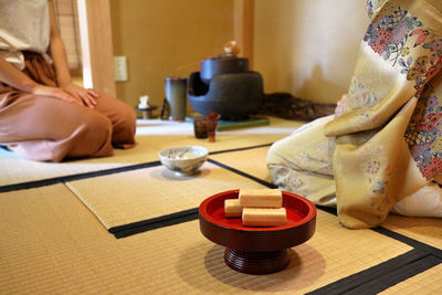 Close-up of child on table at home