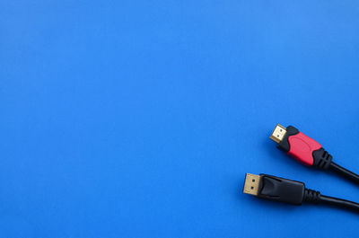Usb cables on blue background