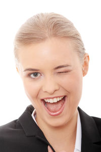 Close-up portrait of a smiling young woman over white background