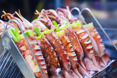 Vietnamese grilled squid in ho thi ky street food, ho chi minh city