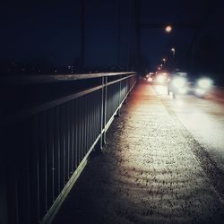 Illuminated road at night