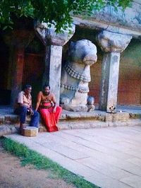 Couple statue outside temple