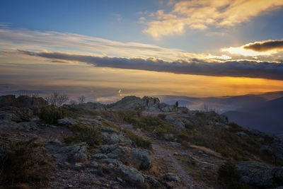 Scenic view of landscape against sky during sunset