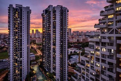 High angle view of buildings against sky during sunset