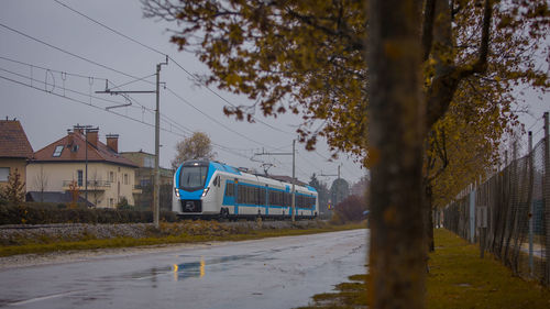 Train on railroad track against sky