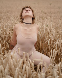 Woman standing on field