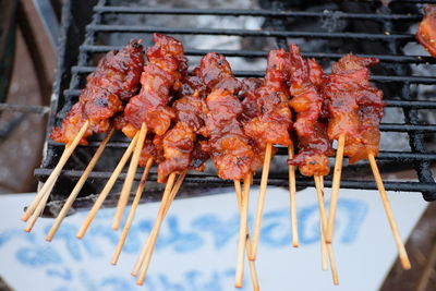 Close-up of meat on barbecue grill