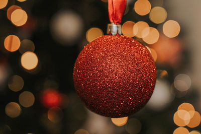 Close-up of red bauble hanging