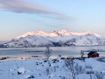 Scenic view of snowcapped mountains against sky