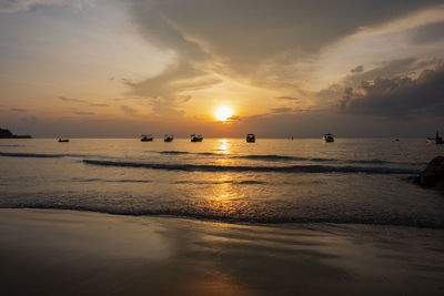 Scenic view of sea against sky during sunset