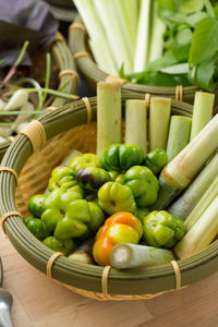 High angle view of vegetables in basket on table