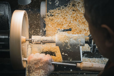 Close-up of man holding machine