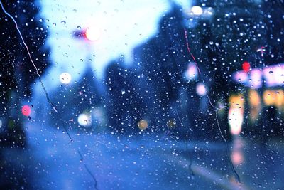 Defocused image of car on road at night