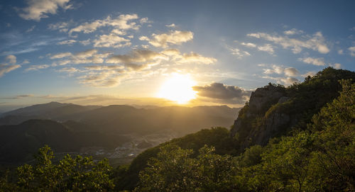 Scenic view of mountains against sky during sunset