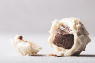 Close-up of cake against white background