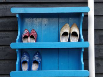 Close-up of shoes on window