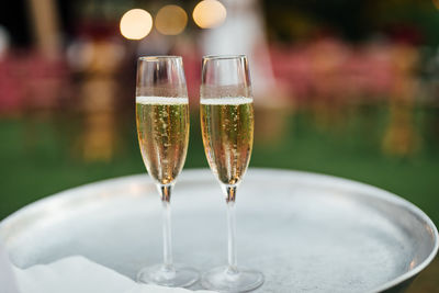 Luxury wine and champagne  for fine dining with and glassware, beautiful blurred  background. 