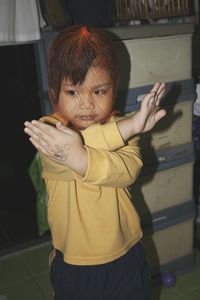 Cute boy playing at home