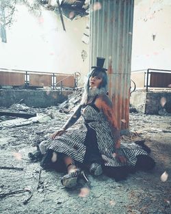 Portrait of woman sitting outdoors