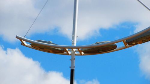 Low angle view of rollercoaster against sky