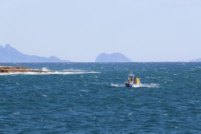 Scenic view of sea against clear sky