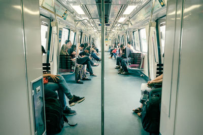 Metro train interior in singapore subway system at rush hour, mass rapid transit, railway network
