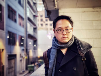 Portrait of young man standing outdoors